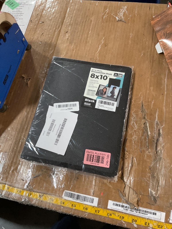 Photo 1 of Dunwell Photo Album 8x10 (Black) with Mounting Paper, 8 x 10 Photo & Art Portfolio Presentation Binder, 24 Clear Sleeves Display 48 Pages, Professional Photography Book for Portraits, Artwork