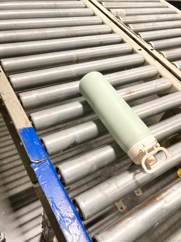 Photo 1 of ***CAP BROKEN***Ello Pop & Fill 22oz Stainless Steel Water Bottle with Quick Fill Technology, Double Walled and Vacuum Insulated Metal, Leak Proof Locking Lid, Sip and Chug, Reusable, BPA Free, Pistachio