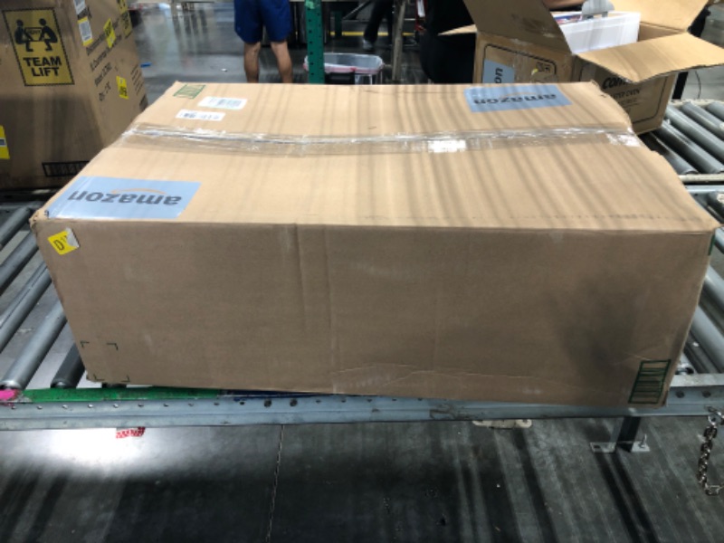 Photo 1 of Hamilton Beach Easy Reach 4-Slice Countertop Toaster Oven With Roll-Top Door, 1200 Watts, Fits 9” Pizza, 3 Cooking Functions for Bake, Broil and Toast, Silver (31344DA)