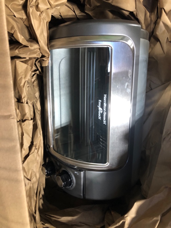 Photo 1 of Hamilton Beach Easy Reach 4-Slice Countertop Toaster Oven With Roll-Top Door, 1200 Watts, Fits 9” Pizza, 3 Cooking Functions for Bake, Broil and Toast, Silver (31344DA)