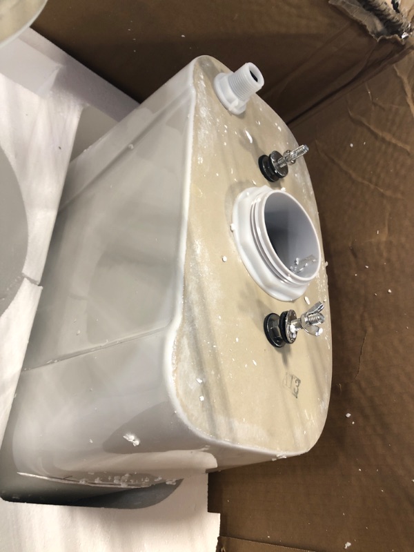 Photo 1 of **HEAVY ITEM***Two Piece Toilet - Elongated Bowl, 19" ADA Compliant Comfort Height, Water Efficient, Slow Close Seat