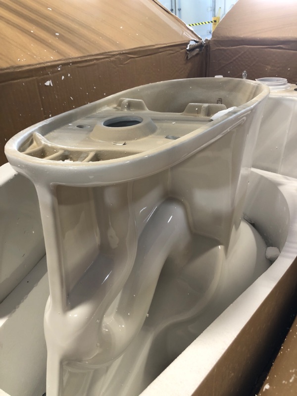 Photo 1 of **HEAVY ITEM***Two Piece Toilet - Elongated Bowl, 19" ADA Compliant Comfort Height, Water Efficient, Slow Close Seat