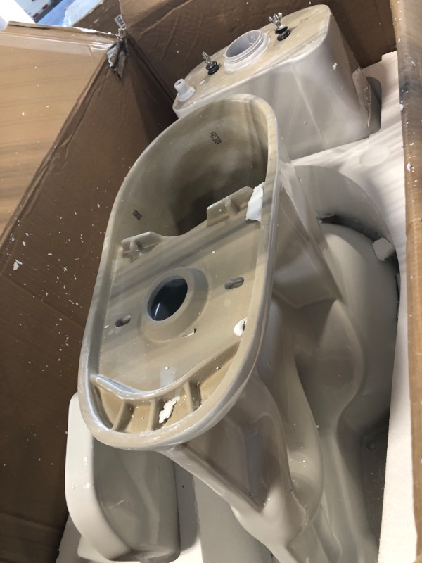 Photo 1 of **HEAVY ITEM***Two Piece Toilet - Elongated Bowl, 19" ADA Compliant Comfort Height, Water Efficient, Slow Close Seat