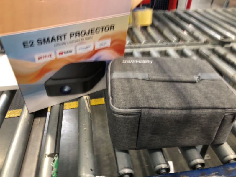 Photo 1 of [2025 Netflix-Licensed | 386+ Built-in Apps] DBPOWER E2 Smart Projector with WiFi and Bluetooth, Mini Projector 4K Support with Netflix, Youtube, Disney+, Hulu, Max, Crunchyroll w Portable Case 