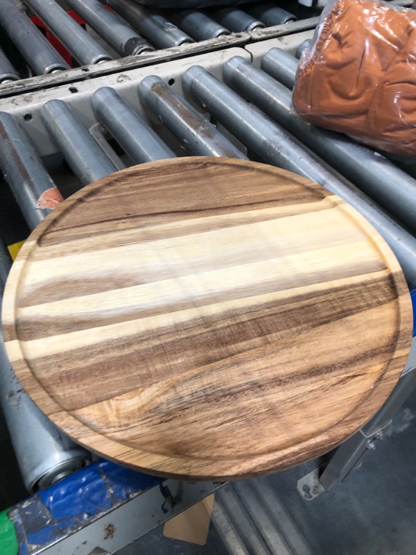 Photo 1 of *same item lighter in color*
 13.8 Inch Round Wooden Decorative Serving Tray for Coffee Table and Home Decor, Round Wood Tray for Table Centerpiece, Small Candle Tray, Acacia, Appetizer Charcuterie Board