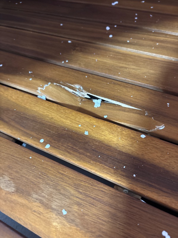 Photo 1 of **Damage to table top-may be fixable**
Christopher Knight Home Soto Outdoor Circular Dining Table - Acacia Wood - Teak/Black