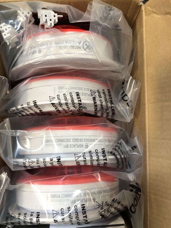 Photo 1 of Kidde Hardwired Smoke Detector, 10-Year Battery Backup, Interconnectable, LED Warning Light Indicators, 4 Pack