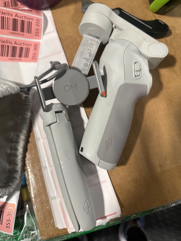 Photo 1 of ***MISSING CABLE***
DJI Osmo Mobile SE, 3-Axis Phone Gimbal for iPhone, Android, Built-in Tripod, Selfie Stick, Gimbal Stabilizer for iphone, Andriod, ActiveTrack 6.0, Vlogging Stabilizer for Youtube, TikTok, Travel