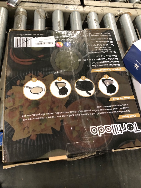 Photo 1 of ***USED****Cast Iron Tortilla Press 12 inch, Heavy Duty Tortilla Pataconera, Flour Tortilla Press with Foldable Handle, Taco press with Some Parchment Paper, Roti Maker, Black