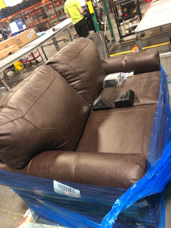 Photo 1 of **DAMAGE**TEARS IN SEVERAL PLACES** Signature Design by Ashley Colleton Classic Leather Match Loveseat with Nailheads, Dark Brown
