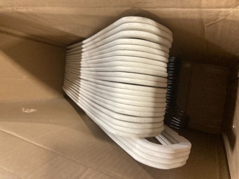 Photo 1 of ****ONLY 25 HANGERS***** Limogoo Ivory Velvet Hangers 50 Pack, Felt Covered Non Slip Fabric with Stackable Cascading Hook, Ultra Thin and Space Saving with 360° Swivel Neck, 15Lbs Capacity for Clothes, Suit, Shirt, Coat