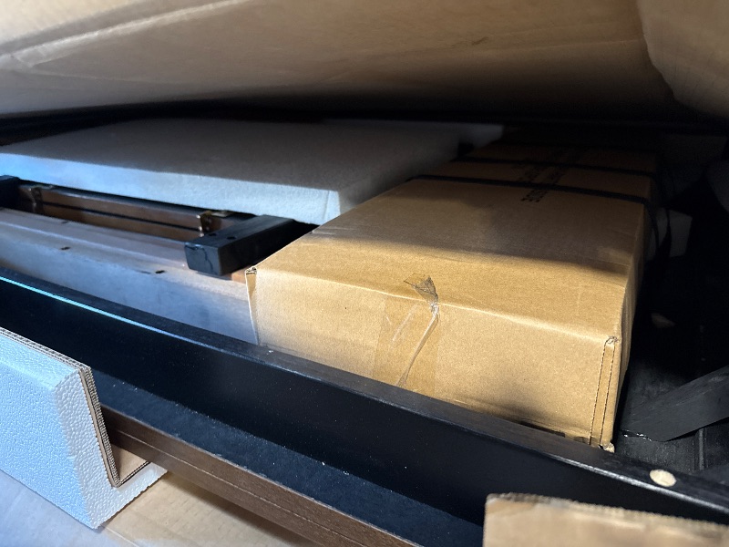 Photo 1 of ** box was opened, unknown of missing parts**Signature Design by Ashley Wildenauer Farmhouse Dining Extension Table with Self-Storing Butterfly Leaf for 6-8 People, Black & Dark Brown