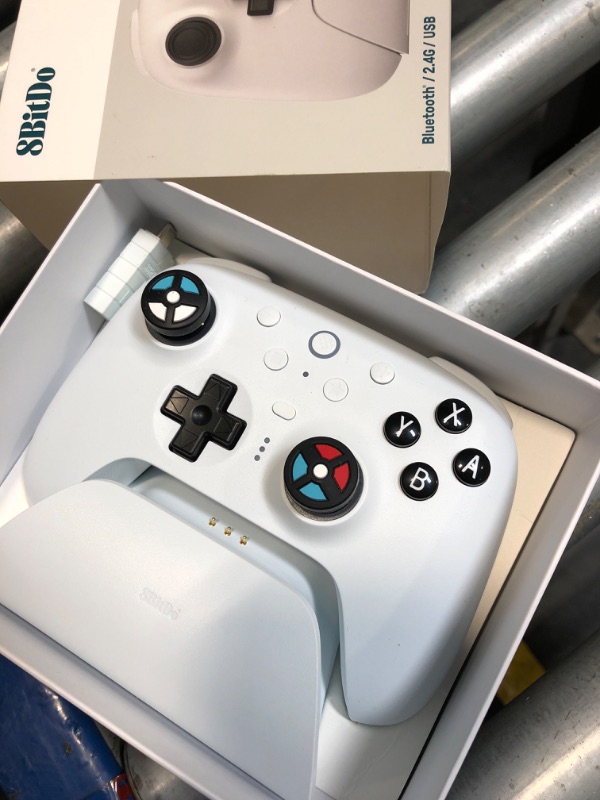 Photo 1 of 8BitDo Ultimate 2 Bluetooth Controller with TMR Joysticks for Switch, Windows PC, Gaming Controller with Switchable Hall Effect/Tactile Triggers, RGB Fire Ring, Charging Dock,Vibration and Motion control, White