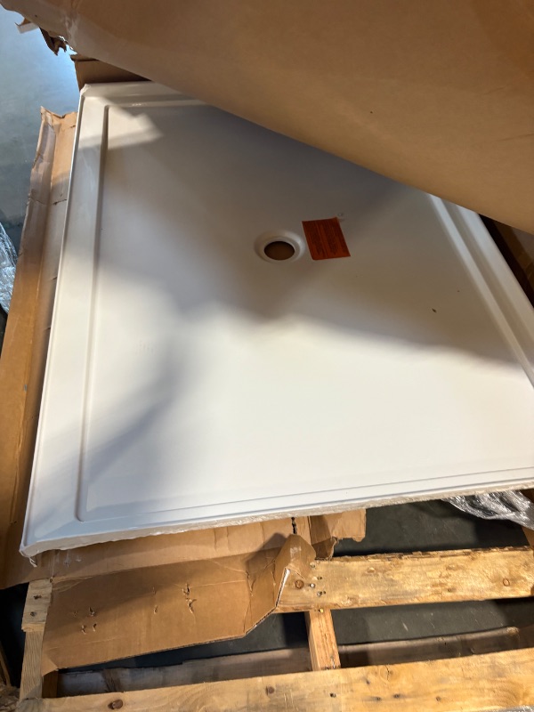 Photo 1 of **MINOR BRAKES ON CRONERS**KOHLER K-8659-0 Rely 60" x 42" Acrylic Alcove Shower Base with Single-Threshold, Molded-In Textured Floor, Center Drain, White