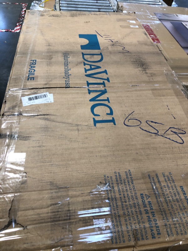 Photo 1 of DaVinci Sammy Scallop 4-in-1 Convertible Crib in White, GREENGUARD Gold Certified