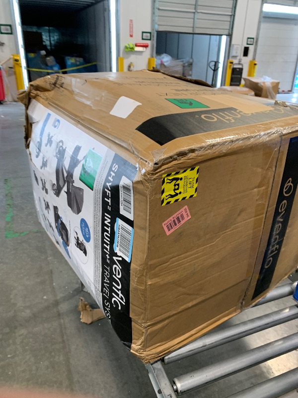 Photo 1 of ****BOX DOES NOT MATCH CONTENTS**** Evenflo Pivot Modular Travel System with LiteMax Infant Car Seat with Anti-Rebound Bar
