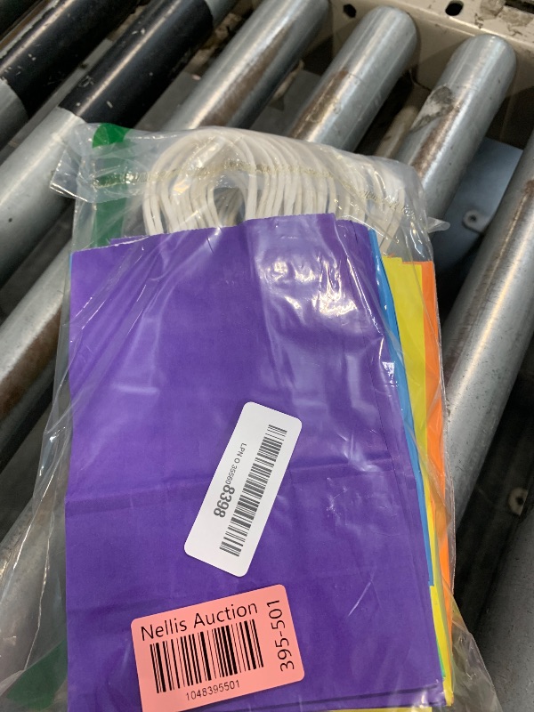 Photo 1 of SUNCOLOR 24-Pack Rainbow Gift Bags with Handles, 8" Multi-Color Paper Party Favor Bags for Goodies. Birthdays, Events, Classrooms & Celebrations