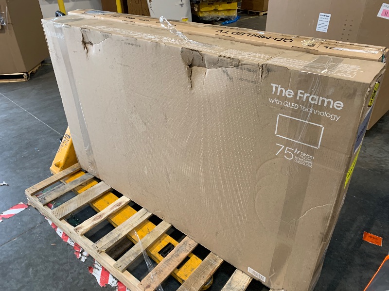 Photo 1 of ***FOR PARTS, SCREEN IS BROKEN!*** Samsung 75-Inch Class QLED 4K LS03D The Frame Series Quantum HDR Smart TV w/Dolby Atmos, Art Mode, Anti-Reflection, Customizable Frame, Slim Fit Wall Mount with Alexa Built-in (QN75LS03D, 2024 Model)