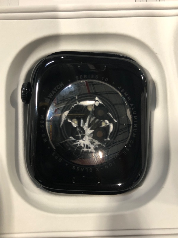 Photo 1 of **DAMAGE** BROKEN**Apple Watch Series 10 [GPS 46mm case] Smartwatch with Jet Black Aluminium Case with Black Sport Band - M/L. Fitness Tracker, ECG App, Always-On Retina Display, Water Resistant