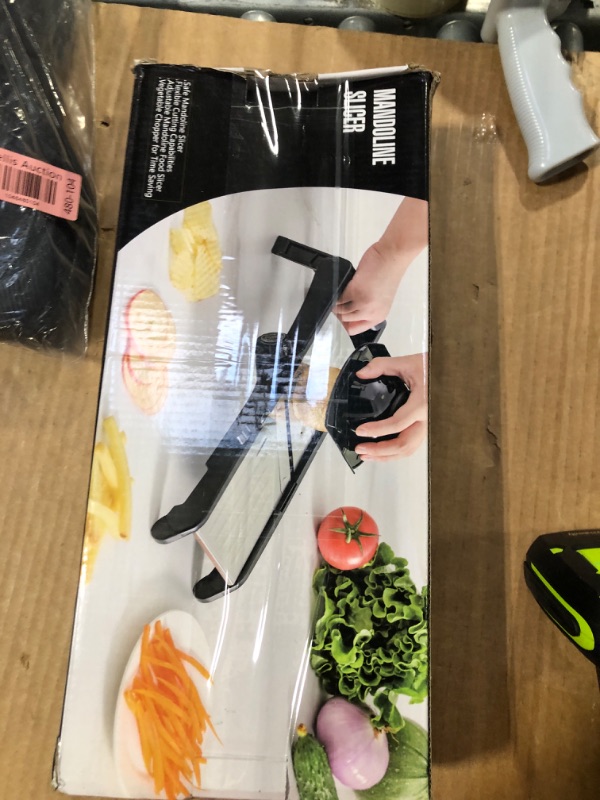Photo 1 of Mandoline Food slicer for kitchen, Adjustable Stainless Steel Mandoline Vegetable slicer, Food slicer Onion Potato Chip French Fry, 7 in-1 Adjustable Blade, Including 1 Pair Cut-Resistant Gloves
