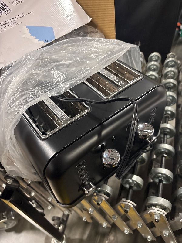 Photo 1 of **ONLY HALF WORKS** RAMJOY Black Toaster 4 Slice, Dual Independent Controls, Extra Wide Slot Toasters for Bagel, Bread, Waffles, 7 Shade Settings, 4 Main Functions, Removable Crumb Tray, 1500 Watts, Black Stainless Steel