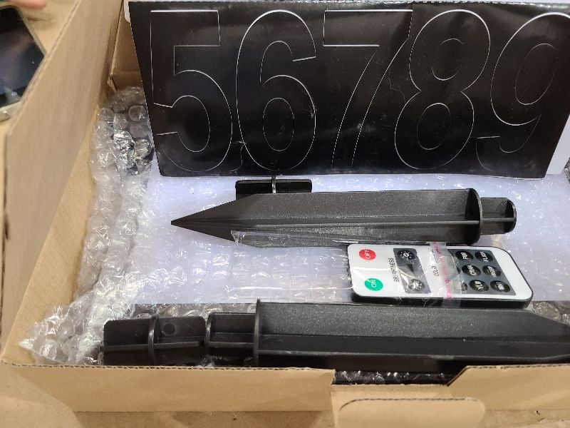 Photo 1 of IVWVI Double Side Solar Address Numbers, Lighted House Numbers for Outside, Waterproof RGBW Color Changing Remote Control, Led Illuminated Solar Address Sign with Stakes for Garden Street Home Yard