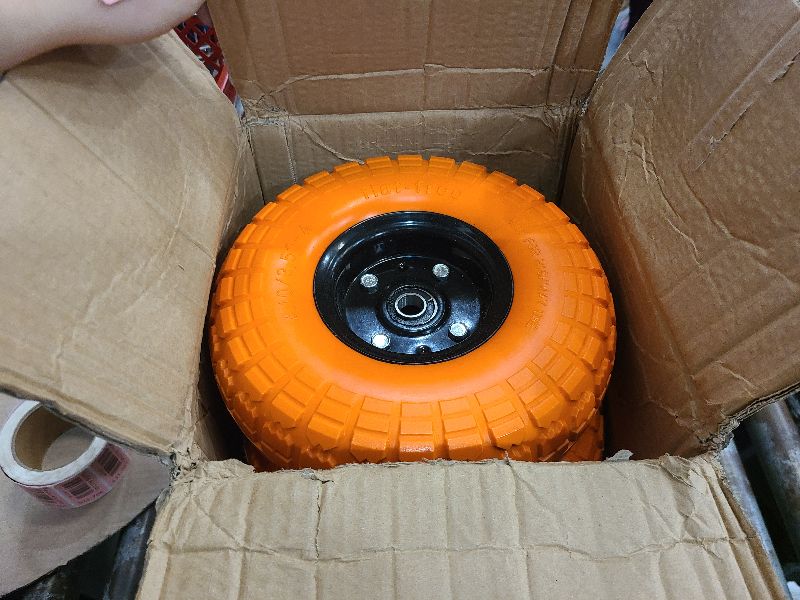 Photo 1 of 10" 4.10/3.50-4 Flat Free Solid Polyurethane Tire and Wheel with 5/8" Axle Borehole, 2.1" Offset Hub for Wheelbarrow,Hand Truck,Generators,Utility Cart(4Pack Orange)
