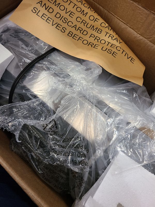 Photo 1 of Hamilton Beach Easy Reach 4-Slice Countertop Toaster Oven With Roll-Top Door, 1200 Watts, Fits 9” Pizza, 3 Cooking Functions for Bake, Broil and Toast, Silver (31344DA)