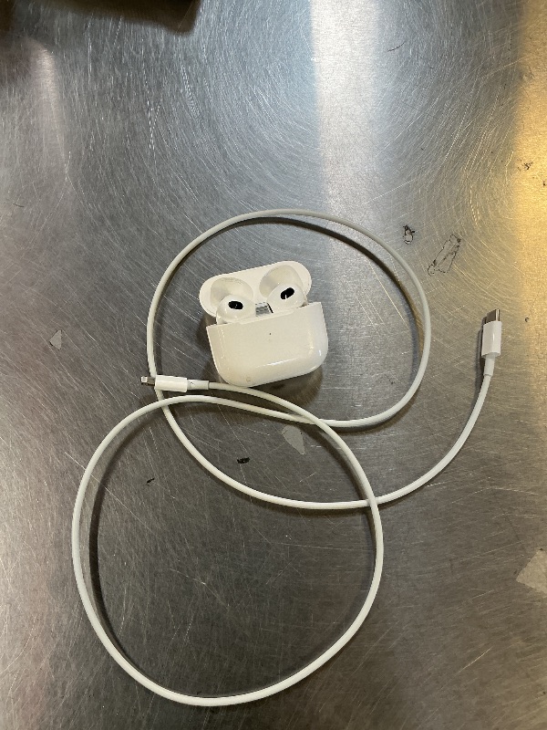 Photo 1 of Apple AirPods with Lightning Charging Case (3rd Generation) White (Renewed Premium)