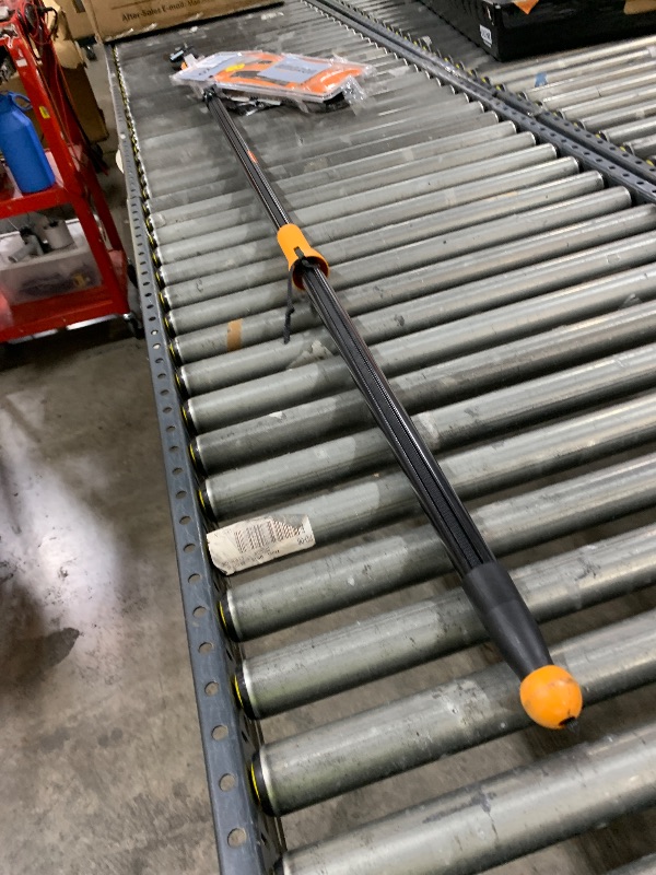 Photo 1 of Fiskars 2-in-1 Extendable Tree Pruner and Pole Saw (Extends 7.9 - 12 feet) with Rotating Head, Pruning Stik Model with15-Inch Double-Grind Saw Blade, and Double Locking System