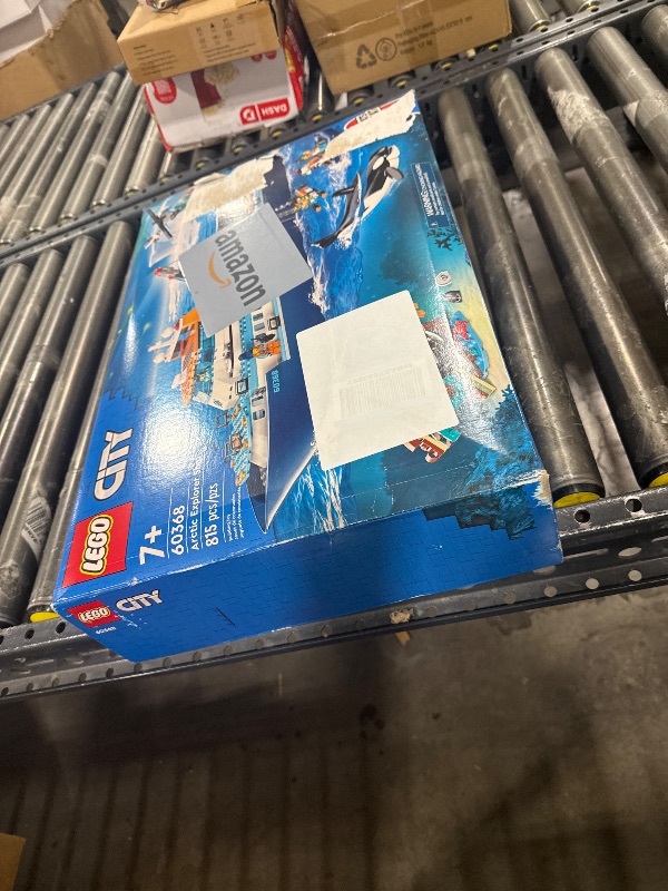 Photo 1 of LEGO City Arctic Explorer Ship 60368 Building Toy Set, Fun Toy Gift for 7 Year Old Boys and Girls, with a Floatable Boat, Helicopter, Dinghy, ROV Sub, Viking Shipwreck, 7 Minifigures and an Orca