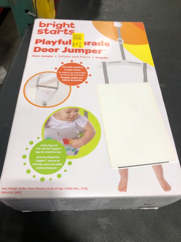 Photo 1 of Bright Starts Playful Parade Door Jumper for Baby with Adjustable Strap, 6 Months and Up, Max Weight 26 lbs