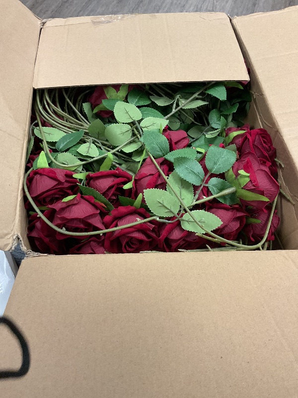 Photo 1 of Jexine 100 Pieces Artificial Roses Flowers Bulk, Long Stem Realistic Fake Silk Roses Bouquet for Table Centerpiece Vases Wedding Party Kitchen Decor(Wine Red)