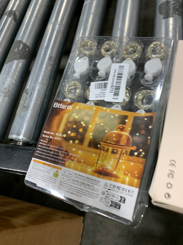 Photo 1 of btfarm 12 Pack Fairy Lights Battery Operated, 7FT 20 LED Mini String Lights Waterproof Silver Wire for Mason Jars Centerpiece Table Crafts Bedroom Christmas Decoration, Cool White