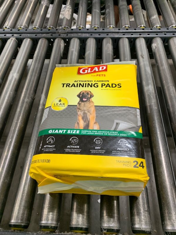 Photo 1 of Glad for Pets Day to Night Activated Carbon Puppy Training Pads for Dogs with Wall Protection and Adhesive - Super Absorbent and Leak Proof Disposable Dog Training Pads, 30" x 36", 24 Count