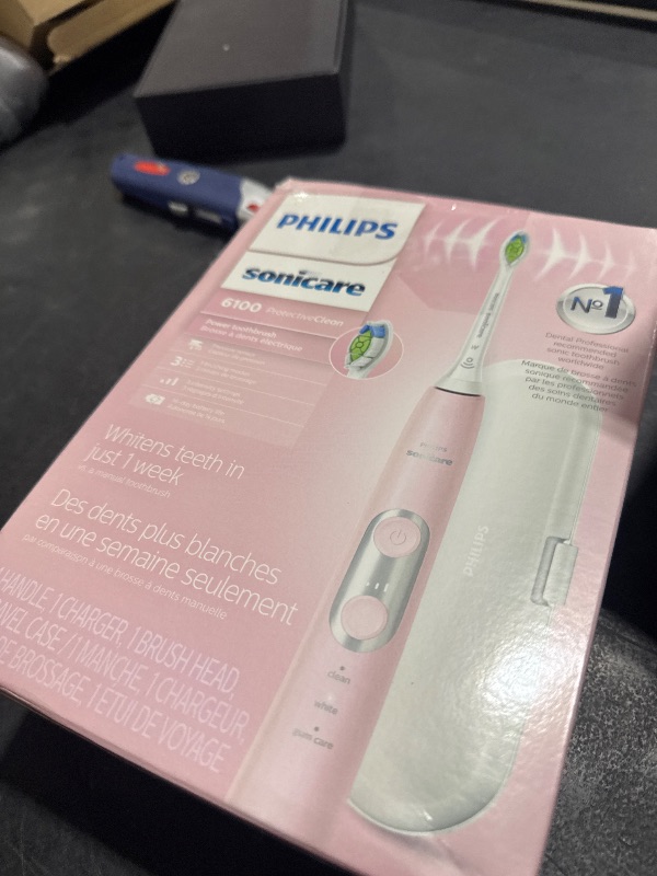 Photo 1 of Philips Sonicare ProtectiveClean 6100 Rechargeable Electric Toothbrush, with Pressure Sensor, 3 Cleaning Modes, SmarTimer and QuadPacer, 14-Day Battery Life, Travel Case, Pink, Model HX6876/21