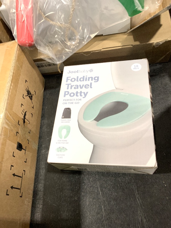 Photo 1 of Jool Baby Folding Travel Potty Training Seat for Toddlers, Fits Round & Oval Toilets, Non-Slip Suction Cups, Includes Free Travel Bag (Aqua)