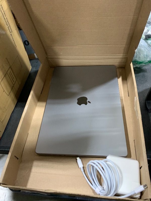 Photo 1 of Apple MacBook Pro Late 2021 with Apple M1 Pro chip (16-inch, 16GB RAM, 512GB SSD) Space Gray (Renewed)