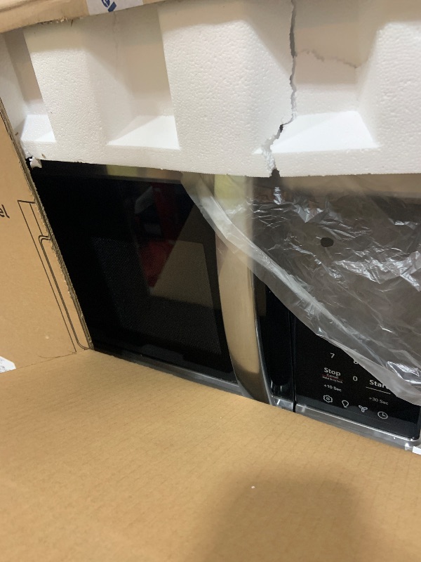 Photo 1 of BLACK+DECKER Over the Range Microwave Oven with Vent and One-Touch Auto Cooking, 1.7 cu. ft. OTR Over Stove Microwave, Stainless Steel, 1000 Watts, EM044K6CE-SS
