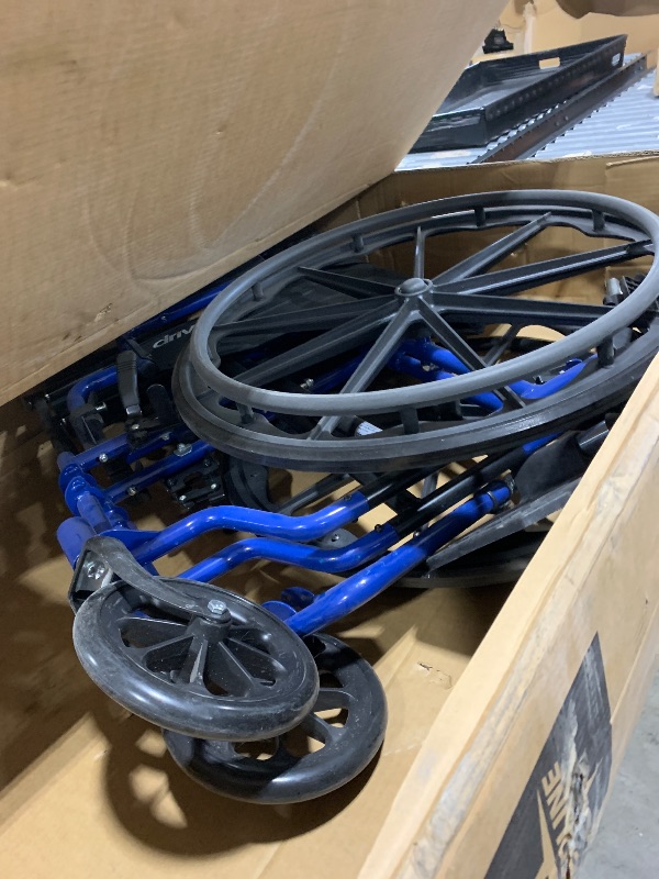 Photo 1 of Drive Medical Blue Streak Wheelchair with Flip Back Desk Arms, Swing Away Footrests,FoldingDesk Length Arms, Alloy Steel, 20 Inch Seat