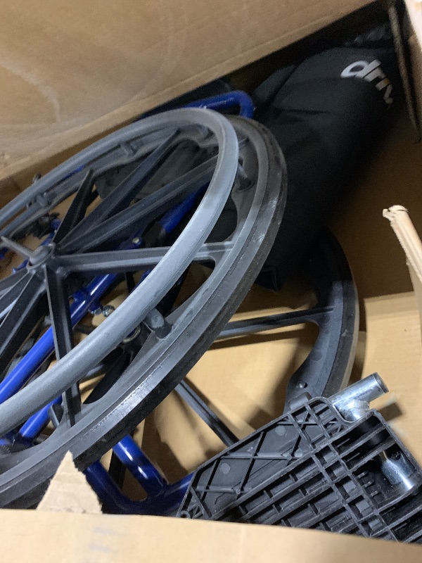 Photo 1 of Drive Medical Blue Streak Wheelchair with Flip Back Desk Arms, Swing Away Footrests,FoldingDesk Length Arms, Alloy Steel, 20 Inch Seat