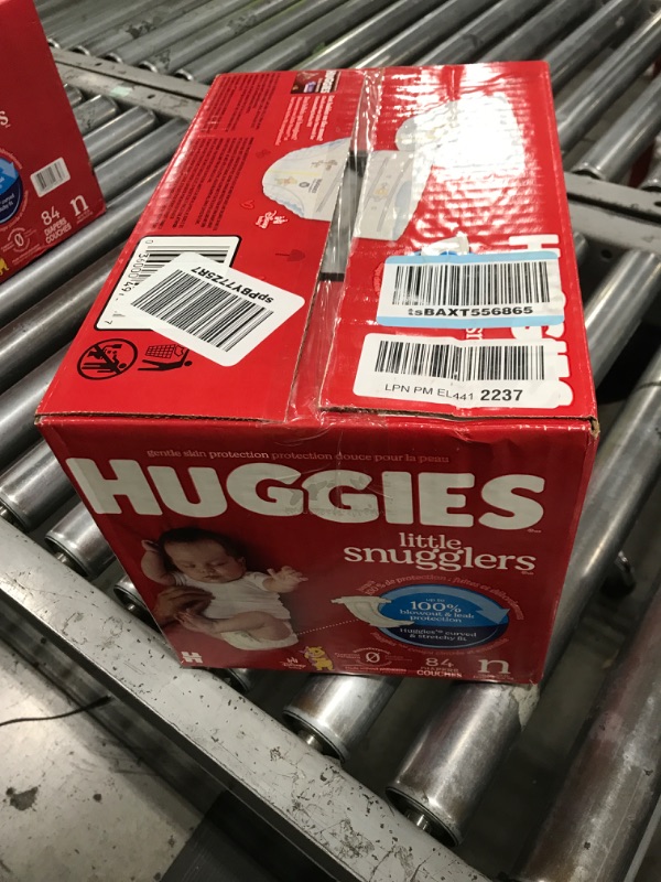 Photo 1 of Huggies Size Newborn Diapers, Little Snugglers Baby Diapers, Size Newborn (up to 10 lbs), 84 Count, Packaging May Vary