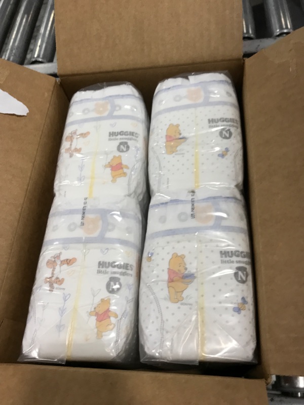 Photo 1 of Huggies Size Newborn Diapers, Little Snugglers Baby Diapers, Size Newborn (up to 10 lbs), 84 Count, Packaging May Vary