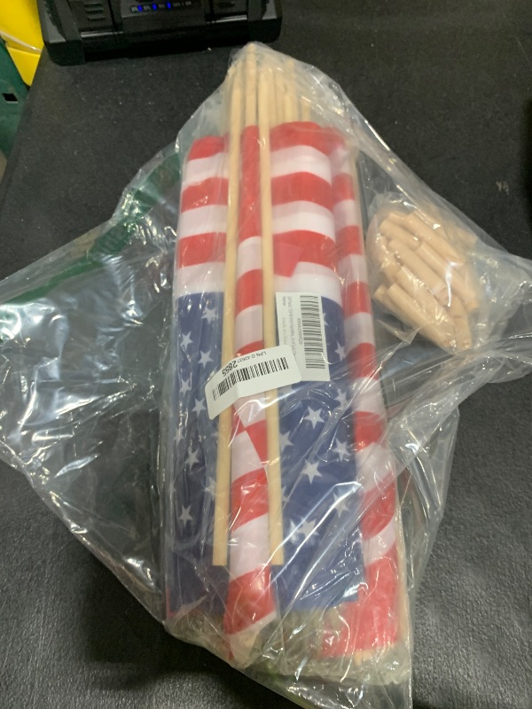 Photo 1 of 24 Pack 12x18 Inch Handheld American Flags on Stick - Patriotic American Flags for Outside, USA Stick Flag Perfect for Independence Day, Memorial Day, 4th of July Decorations (24)