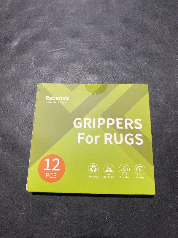 Photo 1 of Rabenda 12 Pcs Rug Tape, Non Slip Rug Pads Grippers for Hardwood Floors and Tiles, Reusable Carpet Tape for Area Rugs, Double-Sided Adhesive Rug Stickers Keep Corners Flat (Black)