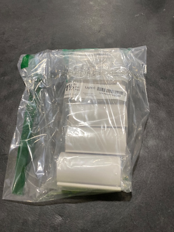 Photo 1 of EZ White Snap Clamp 1-1/2 Inch X 4 Inches Wide for 1-1/2 Inch PVC Pipe 10 Per Bag