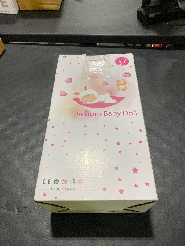 Photo 1 of WOOROY Realistic Reborn Baby Dolls Boy - 19 Inch Lifelike Newborn Baby Dolls Handmade Real Life Baby Dolls Reborn Toddler with Soft Cloth Body Gift Toys for Kids Age 3 +