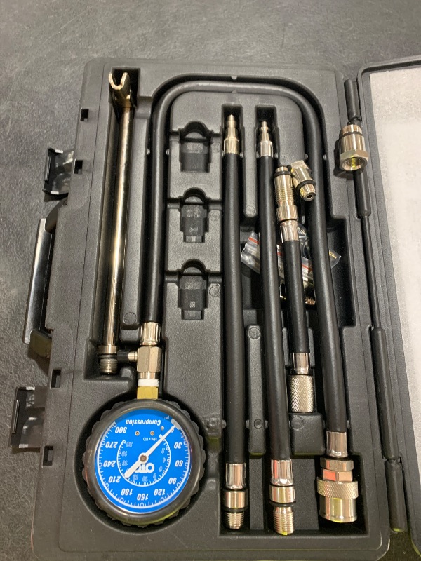 Photo 1 of OTC 5605 Deluxe Compression Tester Kit with Carrying Case for Gasoline Engines