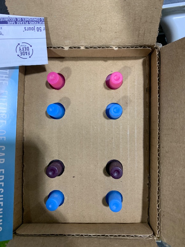 Photo 1 of Febreze Plug Quadruple Air Freshener Refills 4 pack 