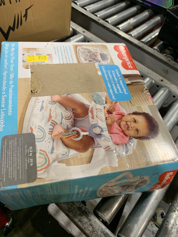 Photo 1 of Fisher-Price Portable Baby Chair Sit-Me-Up Floor Seat with Developmental Toys & Machine Washable Seat Pad, Rainbow Showers